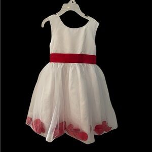 NWT Famcy white dress w/ petticoat.Red sash with rose petals🌹in hem. Different!
